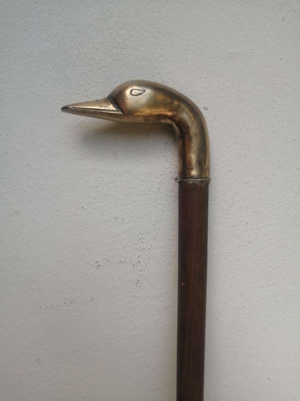 Solid brass duck head walking stick.