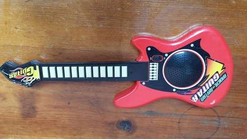 Battery operated toy guitar.