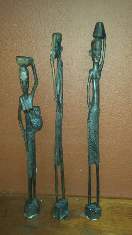 Set of 3 carved wooden statues.