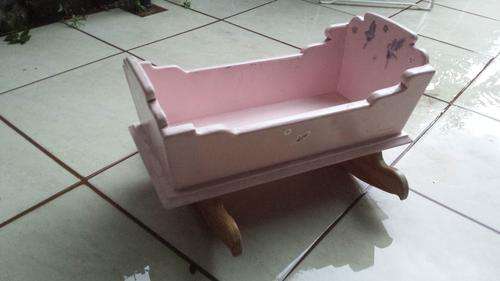 Dolls rocking crib.