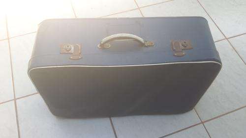 Large, old soft top suitcase.