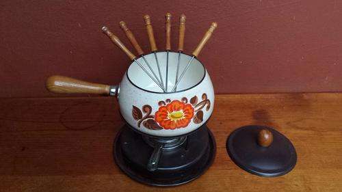 Old enamel fondu set.