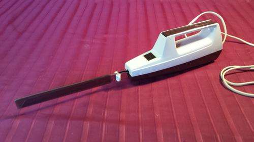 Electric Moulinex bread cutter.