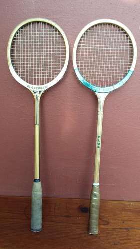 Pair of old wooden Slazzenger squash racquets.