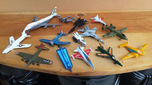 Collection of 14 die cast airplanes.