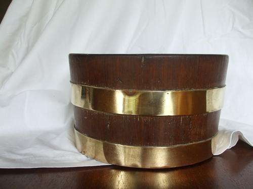 Vintage wooden plant pot with brass bands