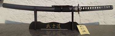 SET OF FOUR DIFFERENT SAMURAI SWORDS