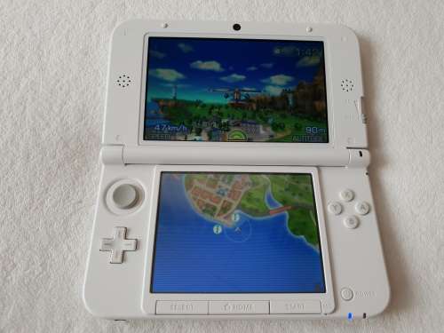 Nintendo 3DS Xl + 5 Games
