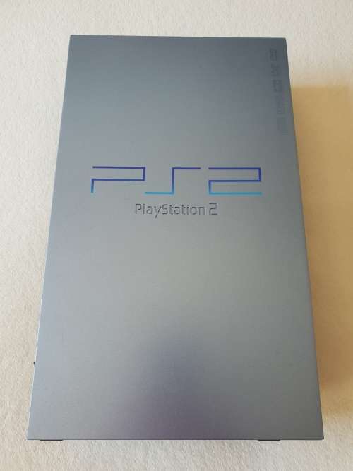 Playstation 2 console + 2 Games