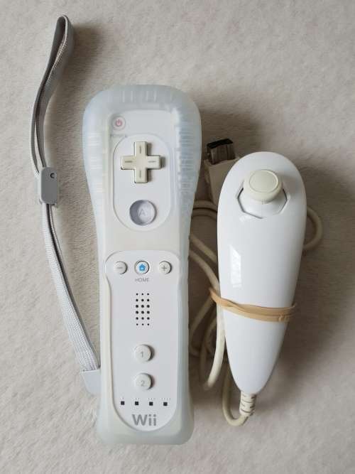 Nintendo Wii Console + 2 Games