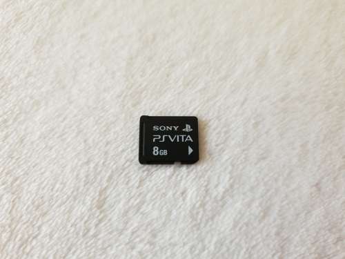 Playstation Vita Wifi Console + 8 GB Memory card + Charger
