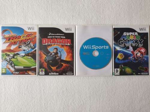 Nintendo Wii Console + 4 Games