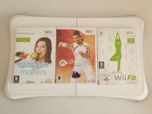 Nintendo Wii Balance Board + Wii Fit,EA Active and Nutrition Matters