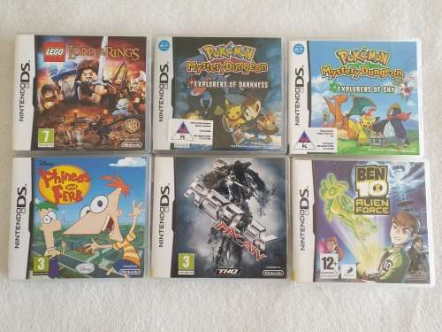 Nintendo DSi XL Console + 6 Games