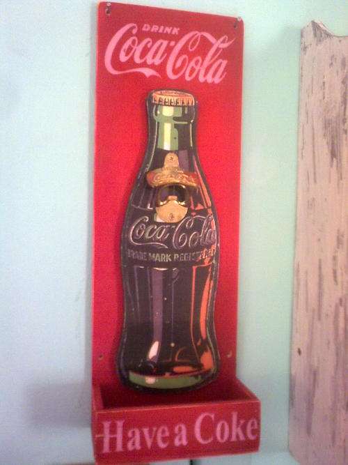 Wall mounted bottle opener