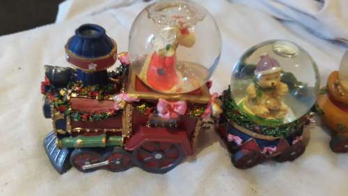 Santa glass snow globe train. Beautiful