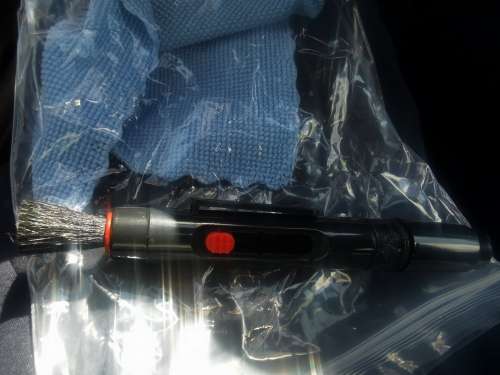 Lens cleaner and cloth