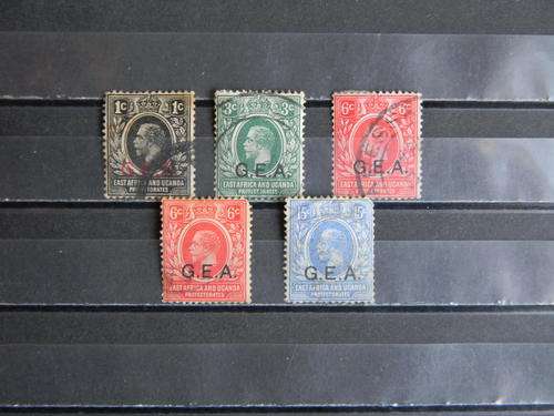 east africa and uganda half set , used      ( G.E.A. overprint ) ( stain on black stamp)