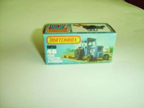 FORD TRACTOR AND HARROW 1979