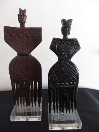 Pair of North African Combs on Perspex Stands