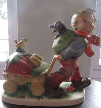 Friedel - Bavaria Western Germany Figurine Boy  Pulling  A Cart