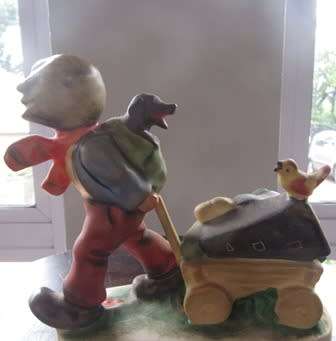 Friedel - Bavaria Western Germany Figurine Boy  Pulling  A Cart
