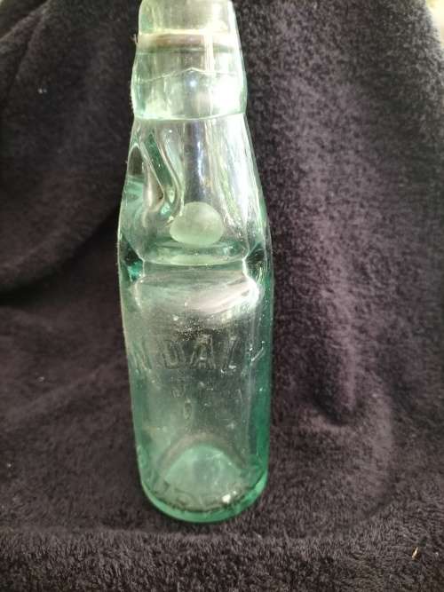 W.Daly Antique Bottle with Marble Top