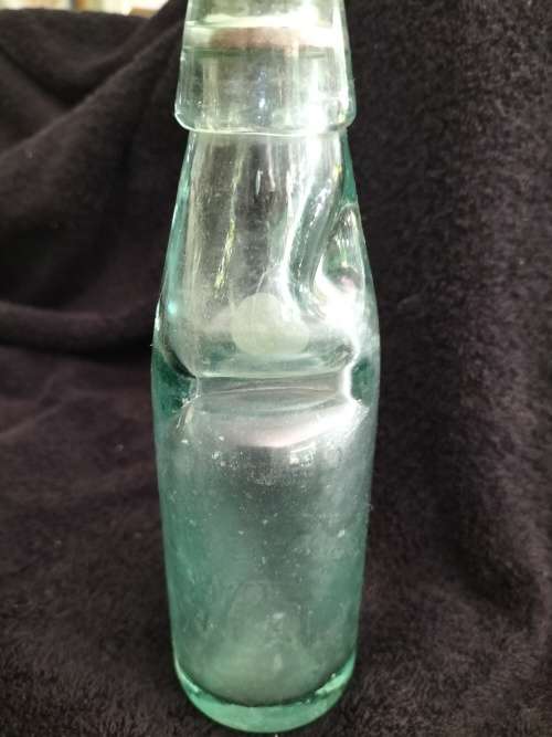 W.Daly Antique Bottle with Marble Top