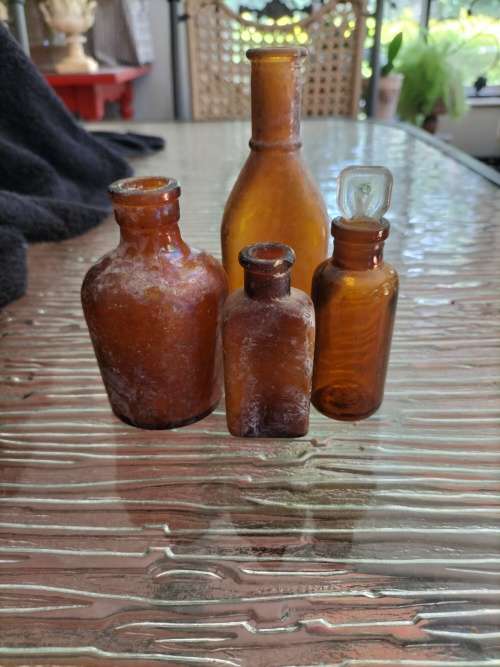 Group of Amber Athrocopy  Bottles