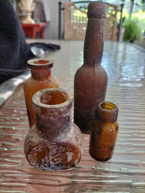 Group of Amber Athrocopy  Bottles