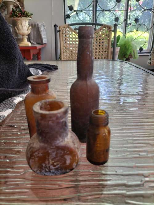Group of Amber Athrocopy  Bottles