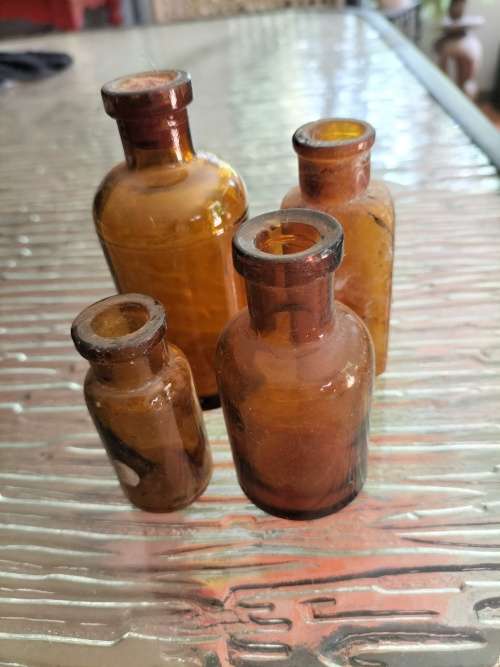 Group of Amber Athrocopy  Bottles