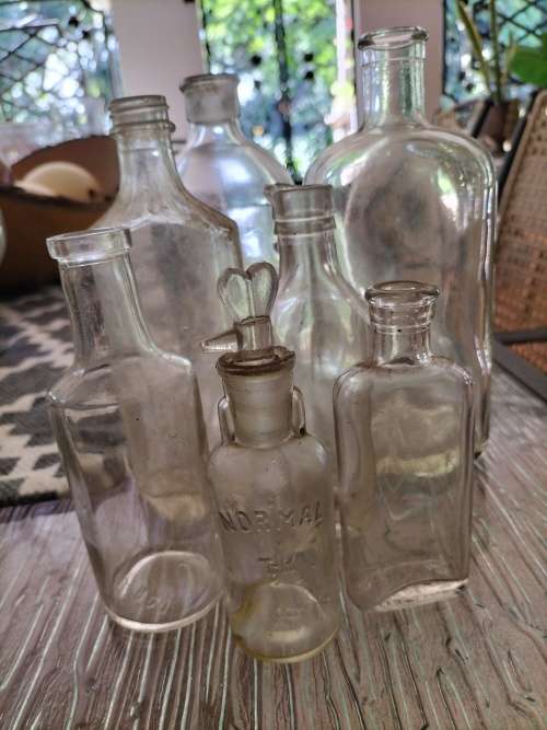 Group of  Clear Vintage Anthropology Bottles
