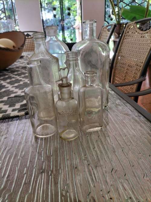 Group of  Clear Vintage Anthropology Bottles