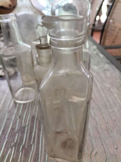 Group of  Clear Vintage Anthropology Bottles