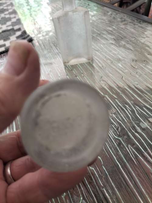 Group of  Frosted Vintage Anthropology Bottles