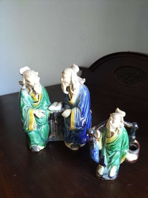Pair  of Mudman Figurines