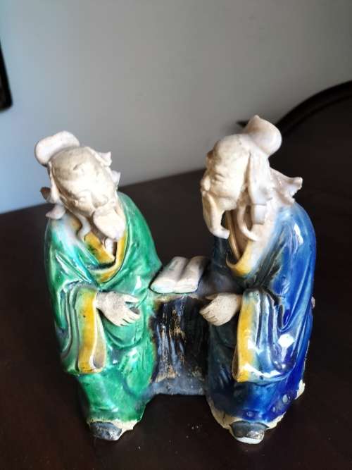 Pair  of Mudman Figurines