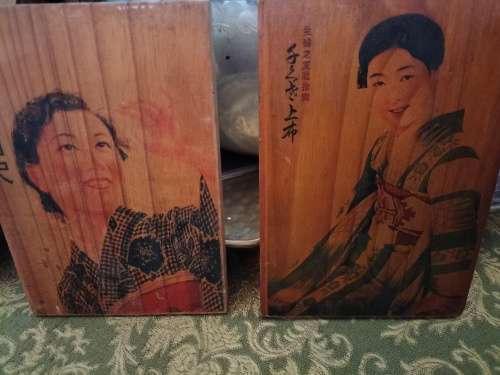 Pair of Wooden Plaques with Oriental Ladies