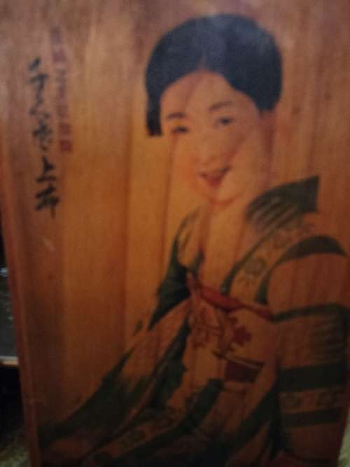 Pair of Wooden Plaques with Oriental Ladies