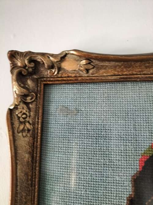 Framed Tapestry of Girl playing an Instrument.