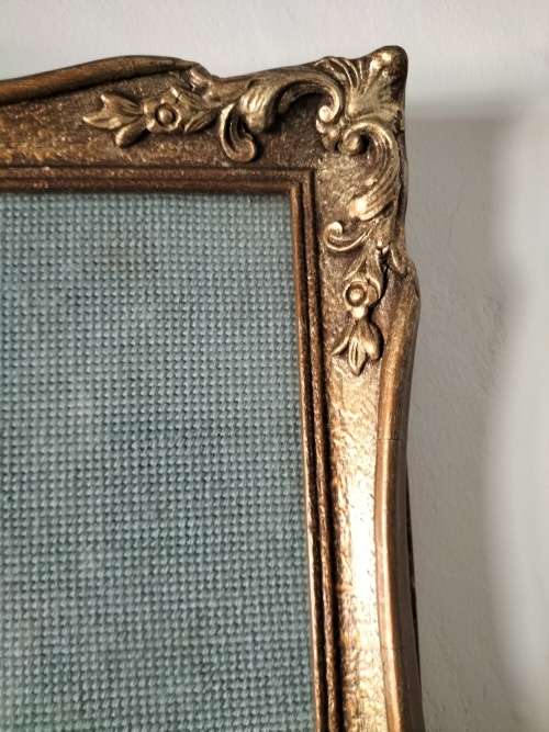 Framed Tapestry of Girl playing an Instrument.
