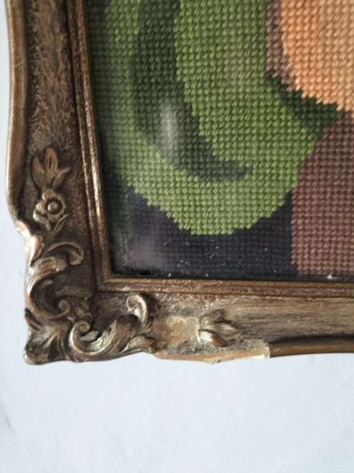 Framed Tapestry of Girl playing an Instrument.