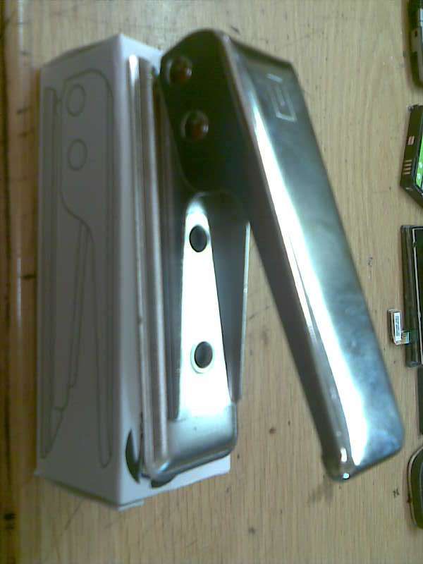 iphone 4 micro sim cutter. with adaptor to fit micro card back intp normal phone again.