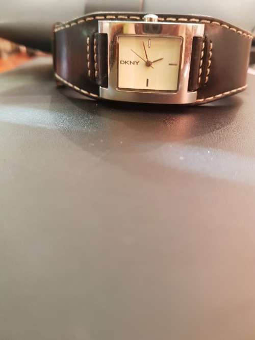 Ladies DKNY black leather strap watch