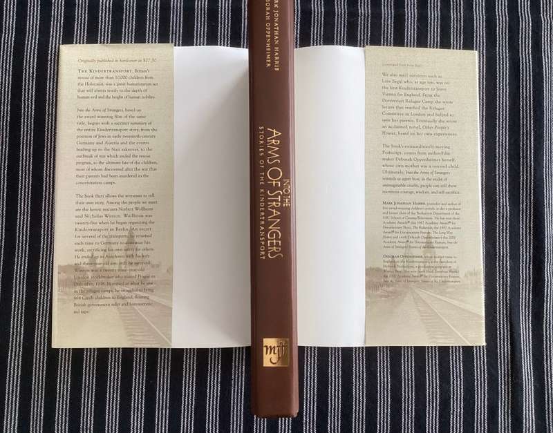 Into the Arms of Strangers. Hardcover, first edition.