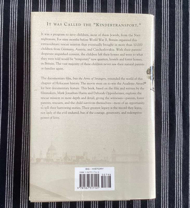 Into the Arms of Strangers. Hardcover, first edition.