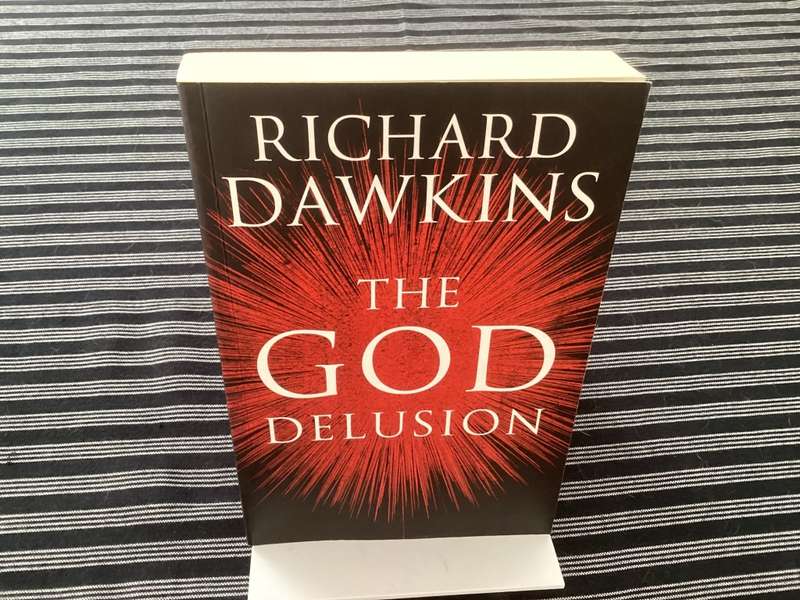 The GOD Delusion, by Richard Dawkins, Large format Paperback in a Fine Condition.