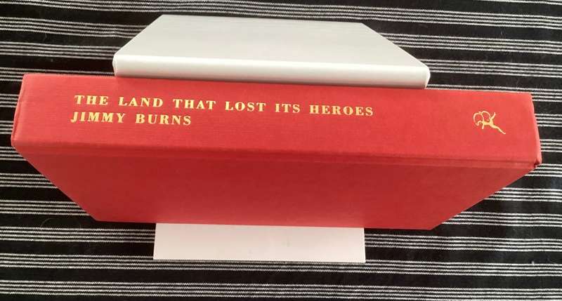 The Land That Lost Its Heroes. Hardcover, 1st Ed. Fine Condition.