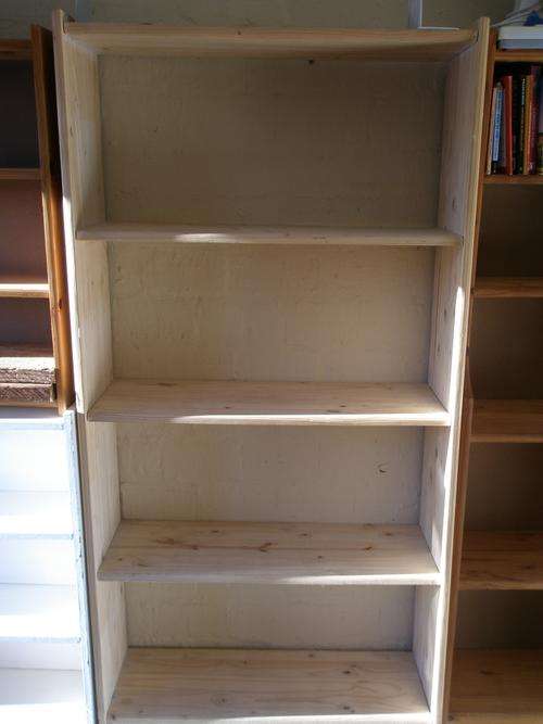 Bookcase of Unstained wood (pine) in perfect condition